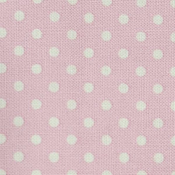 Tela Rosa con lunar blanco.