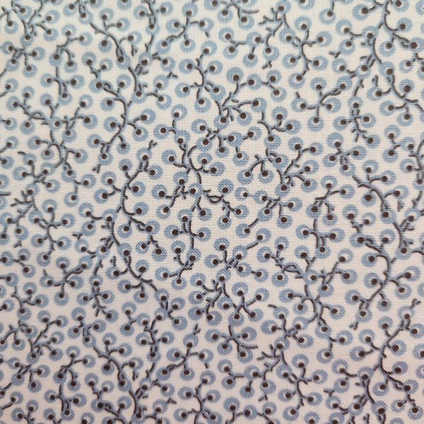 Tela beige dibujo celeste