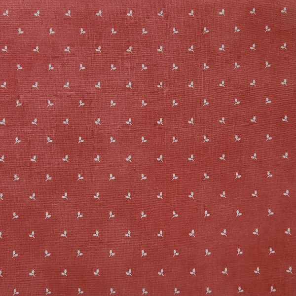Tela coral florecitas beige
