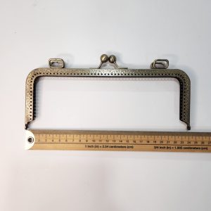 Boquilla Monedero Oro Viejo 24x9cm.